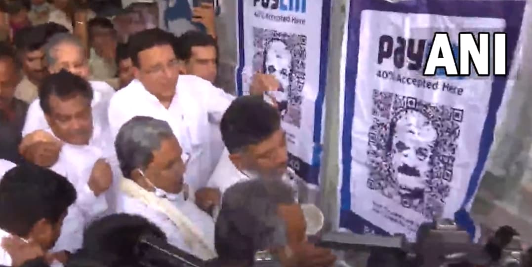 Congress leaders put up the PayCM poster on the Race Course wall in the city opposite the Volvo office. Congress leaders put up the PayCM poster on the Race Course wall in the city opposite the Volvo office.