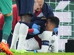 Cristiano Ronaldo is treated on the pitch during the UEFA Nations League match between the Czech Republic and Portugal(AP) Cristiano Ronaldo is treated on the pitch during the UEFA Nations League match between the Czech Republic and Portugal(AP)