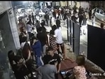 The brawl was caught on a CCTV camera.(Source: @NikhilCh_/Twitter) The brawl was caught on a CCTV camera.(Source: @NikhilCh_/Twitter)