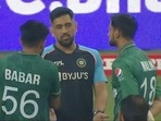 MS Dhoni in interaction with Pakistan captain Babar Azam and Shoaib Malik(Twitter) MS Dhoni in interaction with Pakistan captain Babar Azam and Shoaib Malik(Twitter)