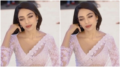 Sobhita’s sheer white translucent netted saree featured decorations in white zari at the borders. She teamed it with a white blouse with white thread details and a plunging neckline. (Instagram/@sobhitad) Sobhita’s sheer white translucent netted saree featured decorations in white zari at the borders. She teamed it with a white blouse with white thread details and a plunging neckline. (Instagram/@sobhitad)
