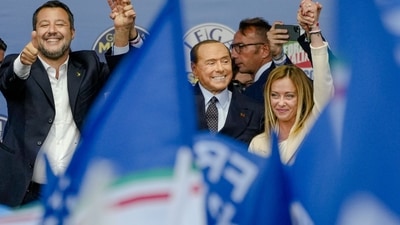 Italy Elections 2022: From left, The League's Matteo Salvini, Forza Italia's Silvio Berlusconi, and Brothers of Italy's Giorgia Meloni attend a rally. (AP) Italy Elections 2022: From left, The League's Matteo Salvini, Forza Italia's Silvio Berlusconi, and Brothers of Italy's Giorgia Meloni attend a rally. (AP)