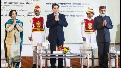 (From left) Justice Sabina, Chief Justice of Himachal Pradesh HC Amjad Ahtesham Sayed and Justice Vivek Singh Thakur greet people at the Mega Legal Services Camp held in Dharamshala on Sunday. (HT Photo) (From left) Justice Sabina, Chief Justice of Himachal Pradesh HC Amjad Ahtesham Sayed and Justice Vivek Singh Thakur greet people at the Mega Legal Services Camp held in Dharamshala on Sunday. (HT Photo)