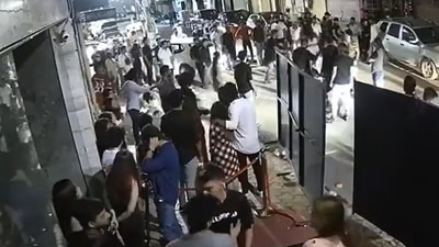 The brawl was caught on a CCTV camera. (Source: @NikhilCh_/Twitter) The brawl was caught on a CCTV camera. (Source: @NikhilCh_/Twitter)