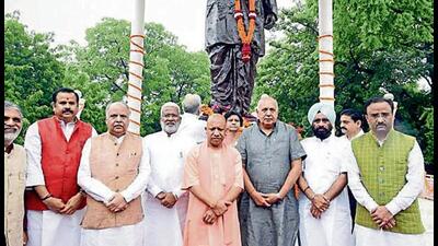 Chief minister Yogi Adityanath with other leaders after paying homage to Deen Dayal Upadhyay in Lucknow on Sunday. (HT PHOTO) Chief minister Yogi Adityanath with other leaders after paying homage to Deen Dayal Upadhyay in Lucknow on Sunday. (HT PHOTO)