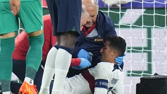 Cristiano Ronaldo is treated on the pitch during the UEFA Nations League match between the Czech Republic and Portugal(AP)