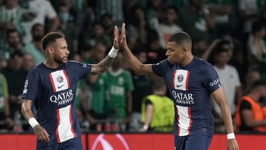 PSG's players Neymar, left, and Kylian Mbappe, celebrate after Mbappe scores the second goal during the group H Champions League match&nbsp;(AP)