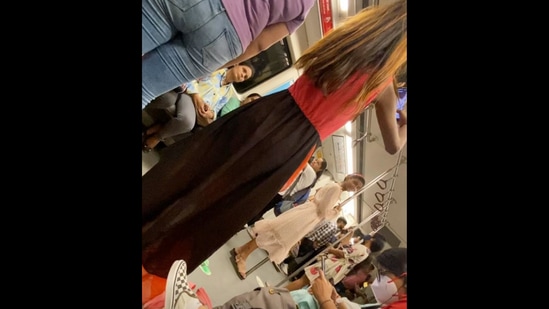 The girl can be seen dancing in a Delhi Metro coach as her friend records her.&nbsp;(Instagram/@thinlay.bhutia)