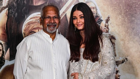 Ponniyin Selvan I director, screenwriter and producer Mani Ratnam poses for pictures with Aishwarya Rai in Mumbai. Aishwarya had made her film debut with Mani Ratnam's Iruvar and worked with him on Raavan and Guru as well. (AFP)(AFP)