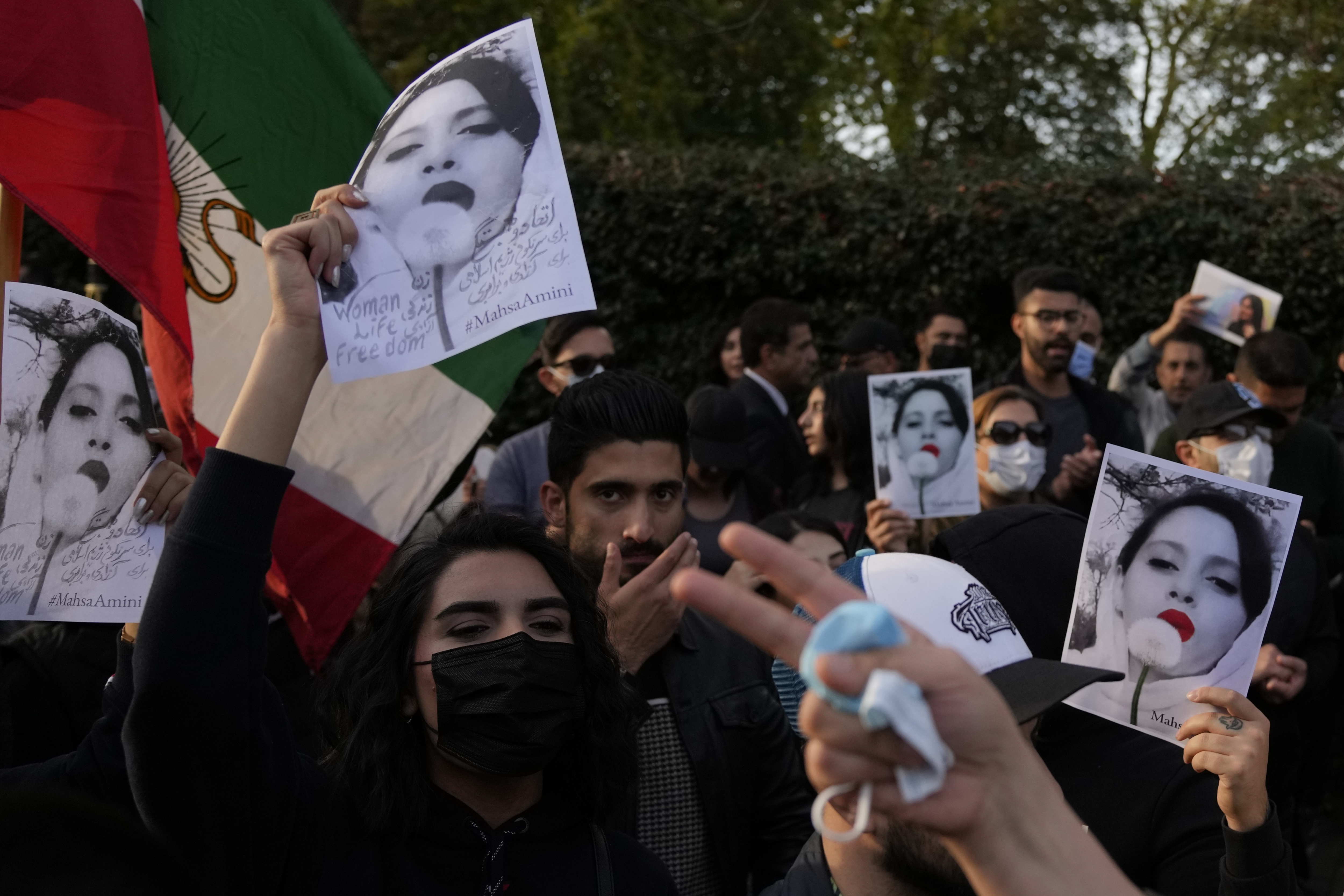 Demonstrators hold placards outside the Iranian Embassy in London, Sunday. They were protesting against the death of Iranian Mahsa Amini. (AP) Demonstrators hold placards outside the Iranian Embassy in London, Sunday. They were protesting against the death of Iranian Mahsa Amini. (AP)