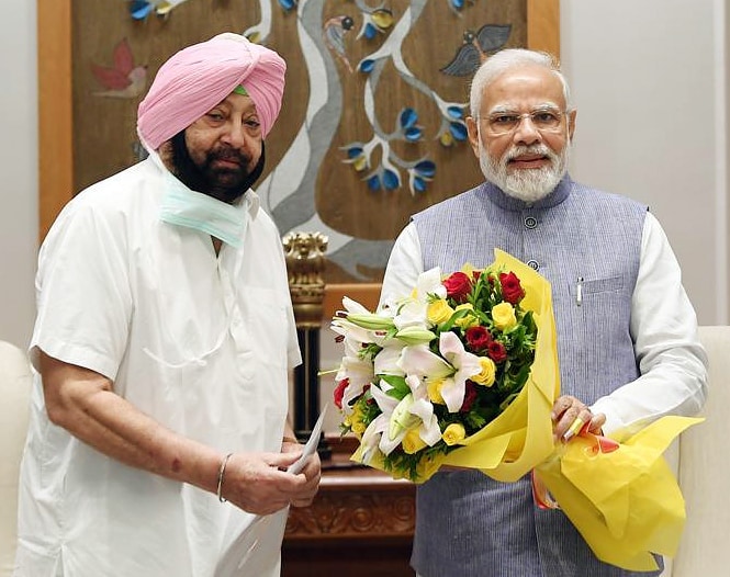 Captain Amarinder Singh with Prime Minister Narendra Modi (Capt. Amarinder Singh Twitter/ANI Photo) (File) Captain Amarinder Singh with Prime Minister Narendra Modi (Capt. Amarinder Singh Twitter/ANI Photo) (File)