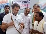 Congress leader Rahul Gandhi interacts with the tribal community leaders during the party's 'Bharat Jodo Yatra' as party MP Shashi Tharoor looks on in Kerala's Palakkad on Monday. (ANI Photo) Congress leader Rahul Gandhi interacts with the tribal community leaders during the party's 'Bharat Jodo Yatra' as party MP Shashi Tharoor looks on in Kerala's Palakkad on Monday. (ANI Photo)