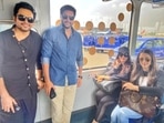 Ponniyin Selvan I cast Karthi, Jayam Ravi, Aishwarya Rai, and Trisha Krishnan inside an airport shuttle bus.