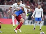 Denmark's Simon Kjaer, center back, lifts France's Christopher Nkunku, during the UEFA Nations League match between Denmark and France at Parken Stadium (AP) Denmark's Simon Kjaer, center back, lifts France's Christopher Nkunku, during the UEFA Nations League match between Denmark and France at Parken Stadium (AP)