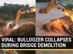 VIRAL: BULLDOZER COLLAPSES DURING DEMOLITION VIRAL: BULLDOZER COLLAPSES DURING DEMOLITION