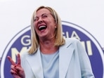 Giorgia Meloni claims leadership of next Italy government, the first woman to hold the country's premiership.