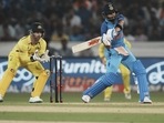 Virat Kohli, right, plays a shot during the third T20 cricket match between India and Australia(AP) Virat Kohli, right, plays a shot during the third T20 cricket match between India and Australia(AP)