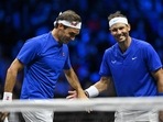 Roger Federer (L) and Rafael Nadal (R) of Team Europe share a joke, playing against USA's Jack Sock and USA's Frances Tiafoe of Team World during their Laver Cup Roger Federer (L) and Rafael Nadal (R) of Team Europe share a joke, playing against USA's Jack Sock and USA's Frances Tiafoe of Team World during their Laver Cup