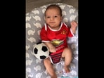 This little baby was given a football by his father. (Instagram/@laread2020) This little baby was given a football by his father. (Instagram/@laread2020)