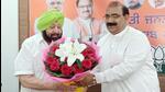 Former chief minister Capt Amarinder Singh being welcomed by Punjab BJP president Ashwani Sharma at the party headquarters in Chandigarh on Monday. (Ravi Kumar/HT) Former chief minister Capt Amarinder Singh being welcomed by Punjab BJP president Ashwani Sharma at the party headquarters in Chandigarh on Monday. (Ravi Kumar/HT)