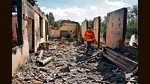 Firefighters work among the ruins of a house, which is said was hit by Azeri shelling during recent border clashes with Azerbaijan, in the settlement of Sotk, Armenia, September 14, 2022 (AFP) Firefighters work among the ruins of a house, which is said was hit by Azeri shelling during recent border clashes with Azerbaijan, in the settlement of Sotk, Armenia, September 14, 2022 (AFP)