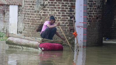 A man rows a dingy on the Yamuna river. (PTI) A man rows a dingy on the Yamuna river. (PTI)