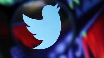 Twitter logo and stock graph are seen through a magnifier displayed in this illustration taken September 4, 2022. REUTERS/Dado Ruvic/Illustration (REUTERS)