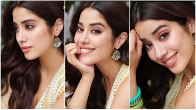 Take a cue from Janhvi Kapoor's alluring makeup this Navratri to turn heads. If you are looking for jewellery then chunky bangles, an emerald-adorned ring and oxidised silver jhumkis are perfect and will go with most of your traditional outfits. Nude lips, kohl-lined eyes, sleek black eyeliner, shimmering eye shadow with blushed cheeks and beaming highlighter for the glam picks are just perfect for your Navratri look. (Instagram/@JanhviKapoor) Take a cue from Janhvi Kapoor's alluring makeup this Navratri to turn heads. If you are looking for jewellery then chunky bangles, an emerald-adorned ring and oxidised silver jhumkis are perfect and will go with most of your traditional outfits. Nude lips, kohl-lined eyes, sleek black eyeliner, shimmering eye shadow with blushed cheeks and beaming highlighter for the glam picks are just perfect for your Navratri look. (Instagram/@JanhviKapoor)