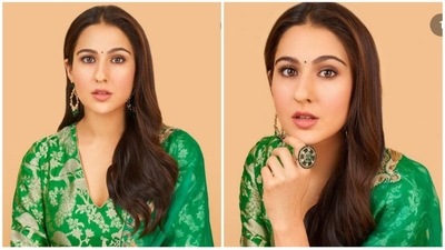Sara's hair and the make-up game is always on point. You can opt for a filled-in brows, pink lips, flushed cheeks, defined eyes and a simple bindi like Sara's and rock your Navratri attire. For jewellery all time trendy embellished hoops and a statement ring can add a glam element in your attire. Be the center of attention this Navratri by making Sara your makeup inspiration. (Instagram/@saraalikhan95) Sara's hair and the make-up game is always on point. You can opt for a filled-in brows, pink lips, flushed cheeks, defined eyes and a simple bindi like Sara's and rock your Navratri attire. For jewellery all time trendy embellished hoops and a statement ring can add a glam element in your attire. Be the center of attention this Navratri by making Sara your makeup inspiration. (Instagram/@saraalikhan95)