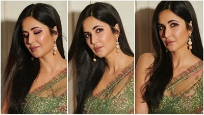 Katrina's makeup is a great choice if you want to look glam-worthy and sparkly. If you are wearing heavier clothing, drop earrings with minimum dewy makeup are ideal since they will balance your look. Glossy pink lips, smoky eyes, and shining highlighter are the ideal finishing touches for your Navratri ensemble. (Instagram/@KatrinaKaif) Katrina's makeup is a great choice if you want to look glam-worthy and sparkly. If you are wearing heavier clothing, drop earrings with minimum dewy makeup are ideal since they will balance your look. Glossy pink lips, smoky eyes, and shining highlighter are the ideal finishing touches for your Navratri ensemble. (Instagram/@KatrinaKaif)