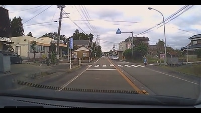 The image, taken from the viral video, shows how drivers in Japan stop their vehicles to help a little girl easily cross the road. (Twitter/@hvgoenka) The image, taken from the viral video, shows how drivers in Japan stop their vehicles to help a little girl easily cross the road. (Twitter/@hvgoenka)