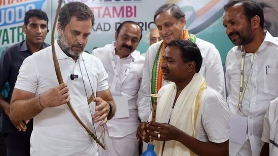 Congress leader Rahul Gandhi interacts with the tribal community leaders during the party's 'Bharat Jodo Yatra' as party MP Shashi Tharoor looks on in Kerala's Palakkad on Monday. (ANI Photo) Congress leader Rahul Gandhi interacts with the tribal community leaders during the party's 'Bharat Jodo Yatra' as party MP Shashi Tharoor looks on in Kerala's Palakkad on Monday. (ANI Photo)