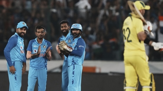 India's captain Rohit Sharma, left, and teammates celebrate after Australia's Glenn Maxwell, second right, is run-out(AP) India's captain Rohit Sharma, left, and teammates celebrate after Australia's Glenn Maxwell, second right, is run-out(AP)