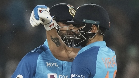 India's Virat Kohli celebrates scoring runs with batting partner Suryakumar Yadav during the third T20 cricket match between India and Australia(AP)