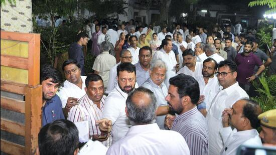 Congress lawmakers outside Rajasthan assembly speaker CP Joshi’s residence. (PTI)