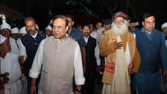 Sadhguru is seen driving a vehicle inside the park with the Assam CM in the front passenger seat. (Twitter | Kaziranga National Park & Tiger Reserve)