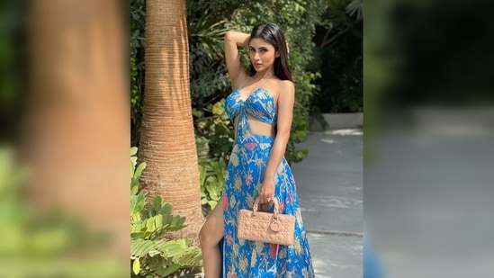 Mouni Roy donned a stunning blue easy-breezy floral gown and struck some bold poses for her Instagram family.(Instagram/@imouniroy)