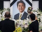 Shinzo Abe State Funeral: People leave flowers and pay their respects to former Japanese prime minister Shinzo Abe.(AFP) Shinzo Abe State Funeral: People leave flowers and pay their respects to former Japanese prime minister Shinzo Abe.(AFP)