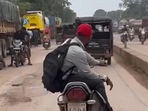 The image, taken from the Twitter video by Durg Police, shows the man doing a bike stunt.