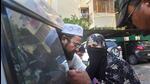 Aneesh, an accused detained during a raid by Special Cell of the Delhi Police for his alleged association with Popular Front of India (PFI), at Amar Colony police station, in New Delhi, Tuesday. (PTI) Aneesh, an accused detained during a raid by Special Cell of the Delhi Police for his alleged association with Popular Front of India (PFI), at Amar Colony police station, in New Delhi, Tuesday. (PTI)