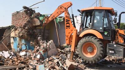 According to the police, the demolished property belonged to one Bijendra alias Lala. Police said three houses, 18 shops, three godowns and one office was razed after his family was served three notices in advance. (HT Photo) According to the police, the demolished property belonged to one Bijendra alias Lala. Police said three houses, 18 shops, three godowns and one office was razed after his family was served three notices in advance. (HT Photo)