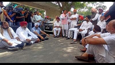 Punjab Congress MLAs holding a mock assembly session in the parking lot of the Vidhan Sabha in Chandigarh on Tuesday after the Speakersuspended them for the day for disrupting the House proceedings. (Ravi Kumar/HT) Punjab Congress MLAs holding a mock assembly session in the parking lot of the Vidhan Sabha in Chandigarh on Tuesday after the Speakersuspended them for the day for disrupting the House proceedings. (Ravi Kumar/HT)