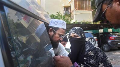 Aneesh, an accused detained during a raid by Special Cell of the Delhi Police for his alleged association with Popular Front of India (PFI), at Amar Colony police station, in New Delhi, Tuesday. (PTI) Aneesh, an accused detained during a raid by Special Cell of the Delhi Police for his alleged association with Popular Front of India (PFI), at Amar Colony police station, in New Delhi, Tuesday. (PTI)