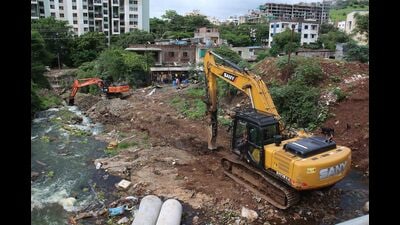 After visits to various sites that were inundated due to heavy rain last month the civic body has now decided to clean these nullahs on a priority basis. (HT FILE PHOTO)