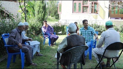 Altaf Bukhari supporters at his house in Uri. (HT Photo)