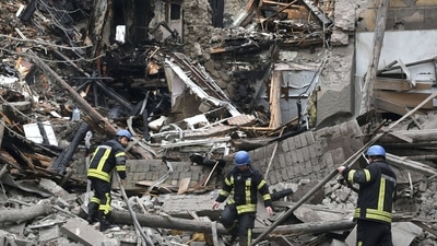 Russia-Ukraine War: A firefighter works after a Russian attack that heavily damaged a building in Sloviansk, Ukraine. (AP) Russia-Ukraine War: A firefighter works after a Russian attack that heavily damaged a building in Sloviansk, Ukraine. (AP)