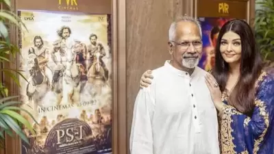 Aishwarya Rai touched Mani Ratnam's feet to take his blessings. Aishwarya Rai touched Mani Ratnam's feet to take his blessings.