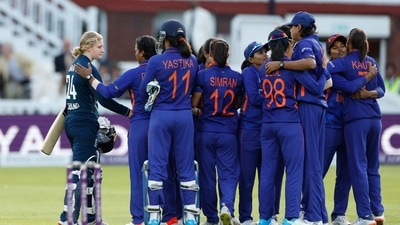 India players celebrate after winning the match as England's Charlie Dean looks dejected&nbsp; (Reuters)