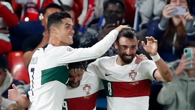 Cristiano Ronaldo celebrates a goal with his Portugal teammates. (REUTERS)