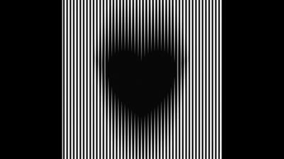 The image shows an illusionary expanding heart against a black and white vertical stripes background.&nbsp; (Best Illusion of the Year Contest)